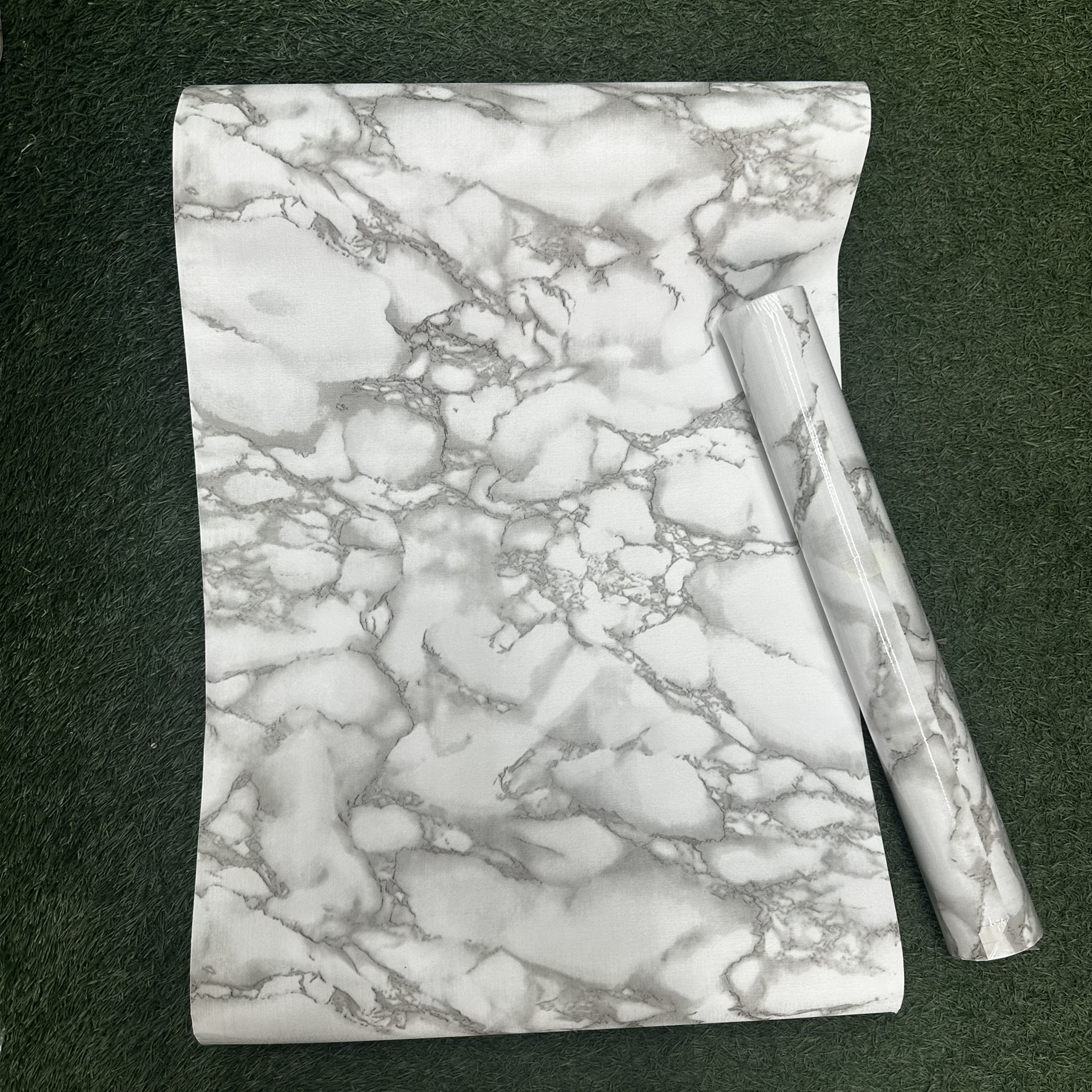 Papier Peint "Marbre de Carrare Classique"
Titre Suggéré : Papier Peint Intissé Effet Marbre Blanc et Gris – Chic, Intemporel et Lumineux
autocollant 10m*0.45cm