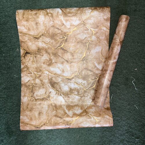 Papier Peint "Marbre Ambré Veiné d'Or"
Papier Peint Luxe Effet Marbre Brun/Ambré – Veinage Or Métallique
autocollant 10m*0.45cm